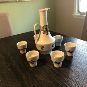 Porcelain wine pitcher with 6 matching cups